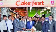 Zainul Abidheen, Director & General Manager, Safari Group of Companies, with staff during the launch of the Cake Festival at Safari Mall, Abu Hamour. 
