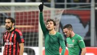 Fiorentina's Italian forward Federico Chiesa (C) celebrates after opening the scoring during the Italian Serie A Football match AC Milan vs Fiorentina on December 22, 2018 at the San Siro stadium in Milan. / AFP / Miguel MEDINA