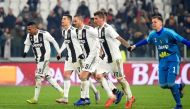 Juventus' Mario Mandzukic, Alex Sandro, Wojciech Szczesny and Leonardo Bonucci celebrate after the match REUTERS/Massimo Pinca