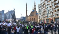 Hundreds of Lebanese demonstrators some of them wearing 