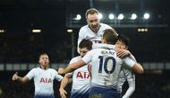 Tottenham Hotspur's English striker Harry Kane (C) with Tottenham Hotspur's South Korean striker Son Heung-Min (R) and Tottenham Hotspur's Danish midfielder Christian Eriksen (top) celebrates scoring their sixth goal during the English Premier League foot