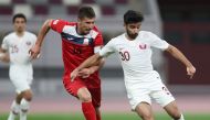 Action during yesterday’s friendly encounter between Qatar and Kyrgyztan which took place at the Khalifa International Stadium in Doha. 