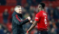 Manchester United's Paul Pogba and interim manager Ole Gunnar Solskjaer after the match Action Images via Reuters/Jason Cairnduff