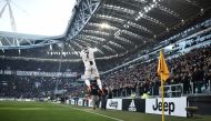 Juventus' Portuguese forward Cristiano Ronaldo celebrates after opening the scoring during the Italian Serie A football match Juventus vs Sampdoria on December 29, 2018 at the Juventus stadium in Turin. / AFP / Marco BERTORELLO