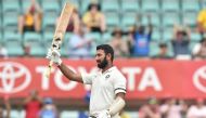 India batsman Cheteshwar Pujara celebrates his century against Australia during the first day of the fourth and final cricket Test at the Sydney Cricket Ground in Sydney on January 3, 2019. AFP / PETER PARKS