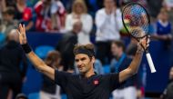 Roger Federer of Switzerland celebrates his victory against Stefanos Tsitsipas of Greece during their men's singles match on day six of the Hopman Cup tennis tournament in Perth on January 3, 2019.   AFP / TONY ASHBY