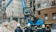 Russian Emergencies Ministry members work at the site of a partially collapsed apartment block in Magnitogorsk, Russia January 3, 2019. REUTERS/Andrey Serebryakov