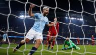 Manchester City's Sergio Aguero celebrates their second goal scored by Leroy Sane (not pictured) as Liverpool's Alisson and Virgil van Dijk look dejected REUTERS/Phil Noble