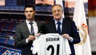Brahim Diaz poses with his shirt alongside Real Madrid president Florentino Perez during the presentation REUTERS/Juan Medina