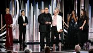 Graham King and Jim Beach (center R) accept the award for Bohemian Rhapsody, winner of Best Motion Picture, Drama. Paul Drinkwater/NBC Universal/Handout via REUTERS