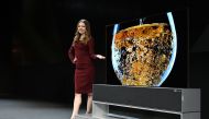 The Signature OLED TV R, a roll-up television, is presented at the LG press conference at the Mandalay Bay Convention Center during CES 2019 in Las Vegas on January 7, 2019. / AFP / Robyn Beck