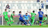 Japan’s Yuya Osako scores their first goal during their AFC Asian Cup match against Turkmenistan in the Group F match at  the Al Nahyan Stadium in Abu Dhabi, yesterday.