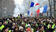 People march in the streets of center Paris, on January 12, 2019 during an anti-government demonstration called by the Yellow Vest 