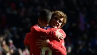 Atletico Madrid's French forward Antoine Griezmann (R) celebrates with Atletico Madrid's Spanish midfielder Koke after scoring a goal during the Spanish League football match between Club Atletico de Madrid and Levante UD at the Wanda Metropolitano stadiu