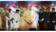 Indian actor Suresh Oberoi (L), producer Sandip S Singh (2L), Maharashtra Chief Minister Devendra Fadnavis (C), actor Vivek Oberoi (2R) and director Umang Kumar pose with posters of the upcoming Bollywood film 