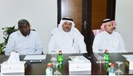Qatar Chamber  officials during the review meeting.