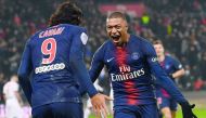 Paris Saint-Germain's French forward Kylian Mbappe celebrates after scoring a goal during the French L1 football match Paris Saint-Germain (PSG) vs Guingamp (EAG), on January 19, 2019 at the Parc des Princes stadium in Paris. AFP / Anne-Christine Poujoula
