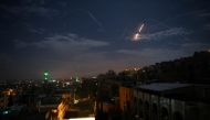 A picture taken early on January 21, 2019 shows Syrian air defence batteries responding to what the Syrian state media said were Israeli missiles targeting Damascus. AFP / STR