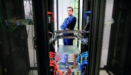 Commercial Director, Brian Roe poses for a photograph beside the cabinets inside Servecentric Data Centre on the outskirts of Dublin in Ireland on December 10, 2018. AFP / Paul Faith