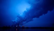 FILE PHOTO: Water vapour rises from the cooling towers of the Jaenschwalde lignite-fired power plant of Lausitz Energie Bergbau AG (LEAG) in Jaenschwalde, Germany, January 24, 2019. REUTERS/Hannibal Hanschke