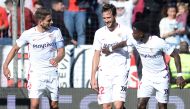 Sevilla's Dutch midfielder Quincy Promes (R) celebrates his goal with Sevilla's Italian-Argentinian midfielder Franco Vazquez (C) and Sevilla's Portuguese midfielder Daniel Carrico during the Spanish league football match between Sevilla FC and Levante UD