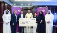 The winners of Diners Club Credit Card spend promotion with Commercial Bank officials.
