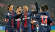 FILE PHOTO: Paris St Germain's Edinson Cavani celebrates scoring their fourth goal with team mates REUTERS/Charles Platiau
