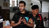 File photo of Hakeem AlAraibi, a former member of Bahrain's national soccer team who holds a refugee status in Australia arrives at court after he was arrested last month on arrival at a Bangkok airport based on an Interpol notice issued at Bahrain's requ