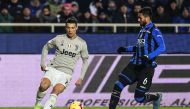 Juventus' Portuguese forward Cristiano Ronaldo (L) dribbles Atalanta's Argentine defender Jose Luis Palomino during the Italian Tim Cup round of eight football match Atalanta Bergamo vs Juventus on January 30, 2019 at the Atleti Azzurri d'Italia stadium i