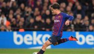 Barcelona's Brazilian midfielder Philippe Coutinho kicks the ball during the Spanish Copa del Rey (King's Cup) quarter-final second leg football match between Barcelona and Sevilla at the Camp Nou stadium in Barcelona on January 30, 2019. / AFP / LLUIS GE