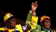 File photo of President Emmerson Mnangagwa and his deputy Constantino Chiwenga greet supporters of his ZANU PF party at a rally in Murombedzi, Zimbabwe November 24, 2018. REUTERS/Philimon Bulawayo/File Photo