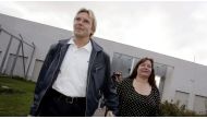 Finland's former Olympic ski jumping champion Matti Nykanen (L) walks out with his friend Mervi Tapola after being released from Kylmakoski prison in Finland in this September 21, 2005 file photo. REUTERS/Jussi Nukari/Lehtikuva/Files