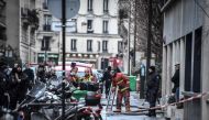 Firefighters are at work near a building that caught fire in the 16th arrondissement in Paris, on February 5, 2019. AFP / STEPHANE DE SAKUTIN