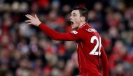 Liverpool's Andrew Robertson gestures during the match. (Action Images via Reuters/Carl Recine)