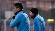 Barcelona's Uruguayan forward Luis Suarez (L) and Barcelona's Argentinian forward Lionel Messi arrive for a training session at the Joan Gamper Sports Center in Sant Joan Despi on February 5, 2019. / AFP / Josep LAGO