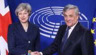 European Parliament President Antonio Tajani shakes hand with British Prime Minister Theresa May before a meeting at the European Parliament on February 7, 2019 in Brussels. AFP / François Walschaerts
