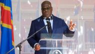 President of the Democratic Republic of the Congo Felix Tshisekedi gestures as he delivers a speech on the sidelines of his first visit as new DRCongo President in Luanda, northwestern Angola, on February 5, 2019. / AFP 
