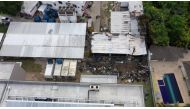 Aerial view of the Brazilian Flamengo football club training center after a building that housed players aged 14 to 17 caught fire at dawn in Vargem Grande neighborhood, west of Rio de Janeiro, Brazil, on February 8, 2019.  AFP / Marie HOSPITAL
