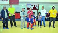 Ashud Ahmed (centre), Ambassador of Bangladesh to Qatar, and Jaafar Ali Al Sarraf, General Manager of Gulf Exchange, with other officials, during Bangladesh Forum Qatar and Gulf Exchange sports activities on the occasion of National Sport Day held at Al A