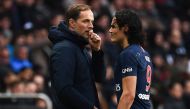 Paris Saint-Germain's German headcoach Thomas Tuchel (L) talks to Paris Saint-Germain's Uruguayan forward Edinson Cavani during the French L1 football match between Paris Saint-Germain (PSG) and FC Girondins de Bordeaux at the Parc des Princes Stadium, in