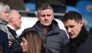 Manchester United's Norwegian caretaker manager Ole Gunnar Solskjaer (C) waits in the stands ahead of the English Premier League football match between Manchester City and Burnley at the Etihad Stadium in Manchester, north west England, on February 10, 20