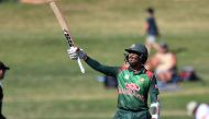 Bangladesh's batsman Mohammad Mithun celebrates reaching his half century (50 runs) during the first one-day international (ODI) cricket match between New Zealand and Bangladesh in Napier on February 13, 2019. AFP / Marty MELVILLE