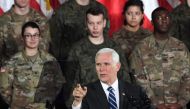 US Vice President Mike Pence delivers a speech at the 1st Airlift Base in Warsaw, on February 13, 2019 during a three-day visit of the US Vice President to Poland. AFP / Janek Skarzynski 
