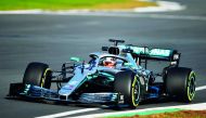 A handout picture taken at Silverstone in central England on February 13, 2019, and released by Mercedes in London, shows Mercedes' British driver Lewis Hamilton in the new Mercedes-AMG F1 W10 EQ Power+ formula one car.