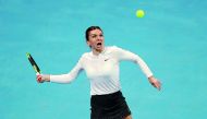 Romanian top seed Simona Halep in action against Ukraine’s Lesia Tsurenko during her round of 16 match  of the Qatar Total Open at the Khalifa International Tennis and Squash Complex in Doha, yesterday.