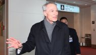 Newly appointed Renault CEO Jean-Dominique Senard speaks to journalists upon his arrival at Haneda International airport in Tokyo on February 14, 2019. - AFP 
