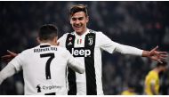 Juventus' Portuguese forward Cristiano Ronaldo (L) celebrates with Juventus' Argentine forward Paulo Dybala after scoring during the Italian Serie A football match Juventus vs Frosinone on February 15, 2019 at the Juventus stadium in Turin. / AFP / Marco 