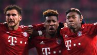 Bayern Munich's David Alaba celebrates scoring their third goal with Kingsley Coman and Leon Goretzka REUTERS/Andreas Gebert