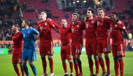 Bayern Munich players celebrate in front of the fans at the end of the match REUTERS/Andreas Gebert