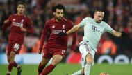 Bayern Munich midfielder Franck Ribery vies with Liverpool midfielder Mohamed Salah during the UEFA Champions League round of 16 first leg football match at Anfield stadium in Liverpool, north-west England on February 19, 2019.  AFP / Oli Scarff.